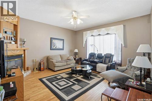 210 Railway Avenue, Mortlach, SK - Indoor Photo Showing Living Room With Fireplace