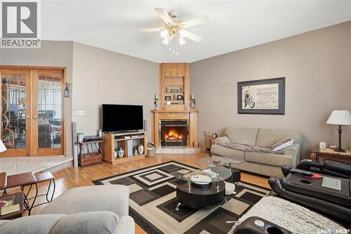 210 Railway Avenue, Mortlach, SK - Indoor Photo Showing Living Room With Fireplace