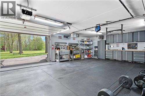 Opens to back of home - 1279 Maple Manor Road, Cambridge, ON - Indoor Photo Showing Garage