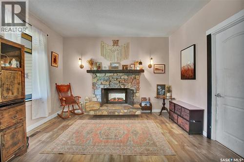 516 1St Street S, Waldheim, SK - Indoor Photo Showing Living Room With Fireplace