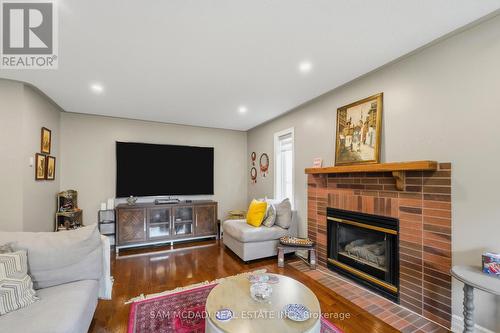 3605 Trelawny Circle, Mississauga, ON - Indoor Photo Showing Living Room With Fireplace