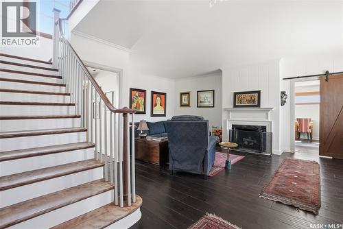 208 Saskatchewan Crescent W, Saskatoon, SK - Indoor Photo Showing Other Room With Fireplace