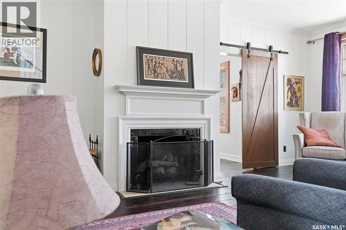 208 Saskatchewan Crescent W, Saskatoon, SK - Indoor Photo Showing Living Room With Fireplace