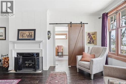 208 Saskatchewan Crescent W, Saskatoon, SK - Indoor Photo Showing Living Room With Fireplace