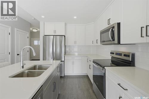 348 Brighton Gate, Saskatoon, SK - Indoor Photo Showing Kitchen With Double Sink With Upgraded Kitchen