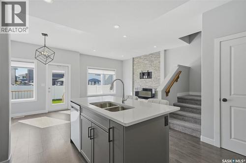 348 Brighton Gate, Saskatoon, SK - Indoor Photo Showing Kitchen With Double Sink