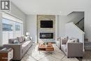348 Brighton Gate, Saskatoon, SK  - Indoor Photo Showing Living Room With Fireplace 