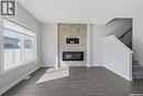348 Brighton Gate, Saskatoon, SK  - Indoor Photo Showing Living Room With Fireplace 