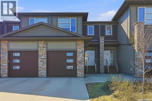 348 Brighton Gate, Saskatoon, SK - Outdoor With Facade