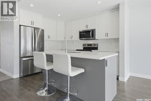 348 Brighton Gate, Saskatoon, SK - Indoor Photo Showing Kitchen With Upgraded Kitchen