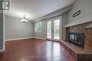 Walkout to Patio & Large Yard - Main - 77 Ecclestone Drive, Brampton, ON  - Indoor With Fireplace 