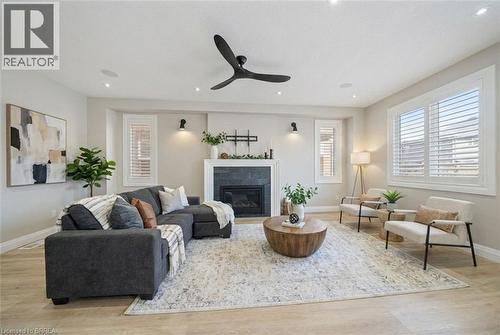 32 Arlington Parkway, Paris, ON - Indoor Photo Showing Living Room With Fireplace
