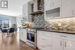 Stainless steel hood fan and gas stove. - 