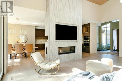 109 Pheasant Run, Blue Mountains, ON - Indoor Photo Showing Living Room With Fireplace