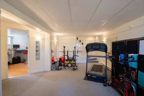 Salle familiale - 9 Rue Elm, Shannon, QC - Indoor Photo Showing Gym Room