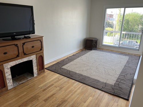 Salon - 993 Rue Melville, Laval (Chomedey), QC - Indoor With Fireplace