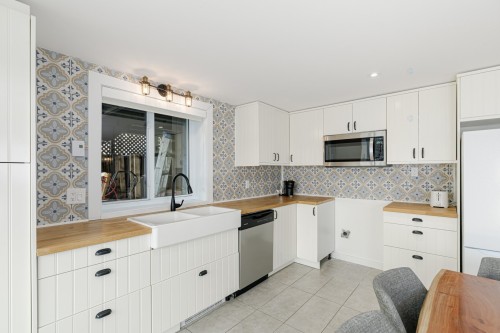 Dwelling - 115  - 115A Rue Diana, Sainte-Agathe-Des-Monts, QC - Indoor Photo Showing Kitchen With Double Sink