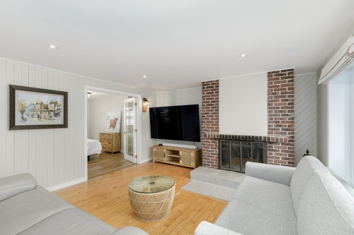 Dwelling - 115  - 115A Rue Diana, Sainte-Agathe-Des-Monts, QC - Indoor Photo Showing Living Room With Fireplace
