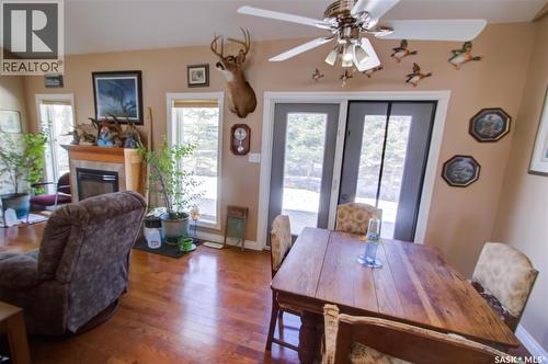 120 1St Avenue E, Love, SK - Indoor Photo Showing Dining Room With Fireplace