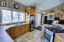120 1St Avenue E, Love, SK  - Indoor Photo Showing Kitchen With Double Sink 