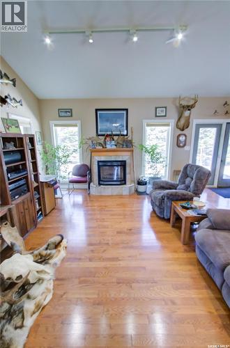 120 1St Avenue E, Love, SK - Indoor Photo Showing Living Room With Fireplace