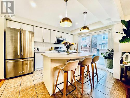 Upgraded Kitchen w breakfast bar - 906 Burrows Gate, Milton, ON - Indoor Photo Showing Kitchen With Stainless Steel Kitchen