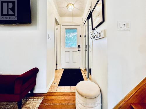 Foyer with hall closet - 906 Burrows Gate, Milton, ON - Indoor Photo Showing Other Room