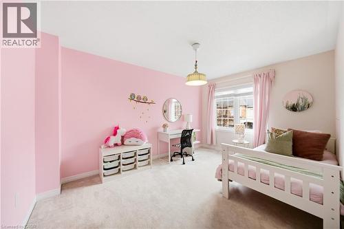 Room featuring light pink walls and neutral carpeting - 2466 Village Common, Oakville, ON - Indoor Photo Showing Bedroom