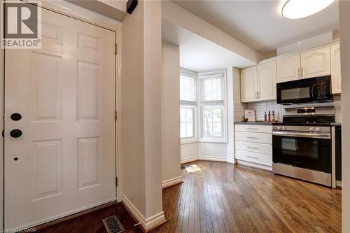 Kitchen entryway featuring wood-finish flooring - 463 Blathwayte Lane, Burlington, ON - Indoor Photo Showing Kitchen