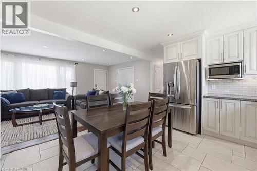 Open-concept living space featuring a dining area, kitchen, and living room - 168 Nugent Drive, Hamilton, ON - Indoor