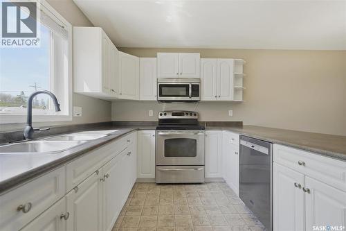 315A 109Th Street, Saskatoon, SK - Indoor Photo Showing Kitchen With Double Sink