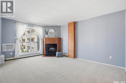 214 207C Tait Place, Saskatoon, SK - Indoor With Fireplace