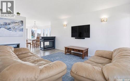 502 Le May Crescent, Saskatoon, SK - Indoor Photo Showing Living Room With Fireplace