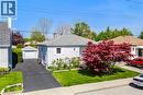Single-story residence featuring light gray siding and a gray shingle roof - 94 Clarendon Avenue, Hamilton, ON  - Outdoor 