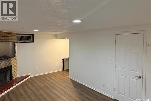 1341 9Th Avenue N, Regina, SK - Indoor Photo Showing Other Room With Fireplace