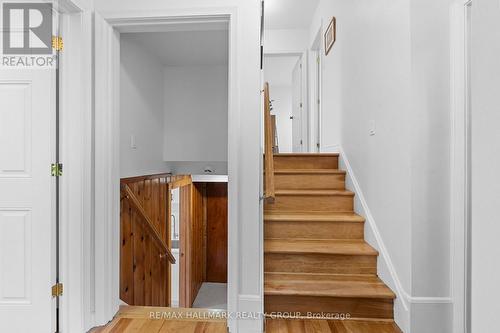 Split-Level Staircase with Warm Finishes - 1981 Navaho Drive, Ottawa, ON - Indoor Photo Showing Other Room
