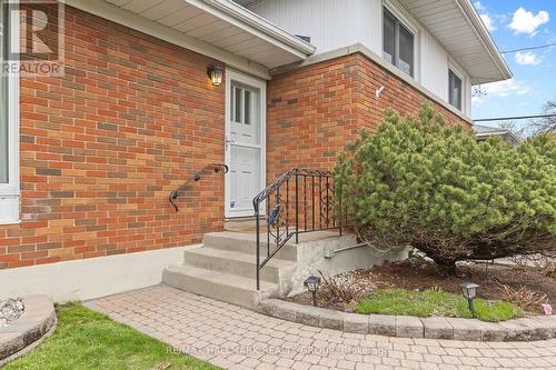 Interlock walkway with landscaped front yard - 1981 Navaho Drive, Ottawa, ON - Outdoor With Exterior