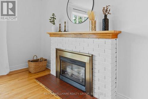 Cozy Fireplace with Wood Mantel - 1981 Navaho Drive, Ottawa, ON - Indoor Photo Showing Living Room With Fireplace