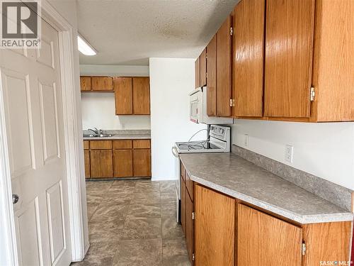 7 Dunfield Crescent, Meadow Lake, SK - Indoor Photo Showing Kitchen With Double Sink
