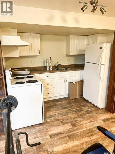 7 Dunfield Crescent, Meadow Lake, SK - Indoor Photo Showing Kitchen With Double Sink