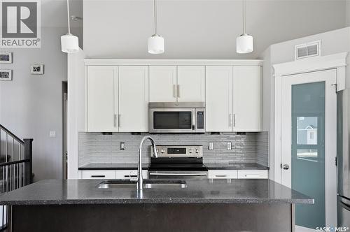 1111 Evergreen Boulevard, Saskatoon, SK - Indoor Photo Showing Kitchen With Upgraded Kitchen
