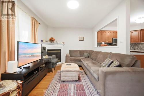 Family room - 3935 Skyview Street, Mississauga, ON - Indoor Photo Showing Living Room With Fireplace