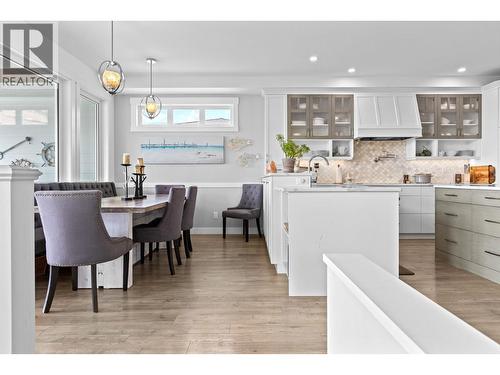 Dining & kitchen - Main floor. - 647 Mt Ida Drive, Coldstream, BC 
