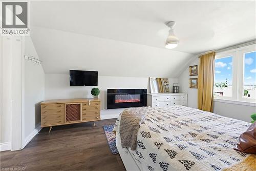 140 Parkdale Avenue S, Hamilton, ON - Indoor Photo Showing Bedroom With Fireplace