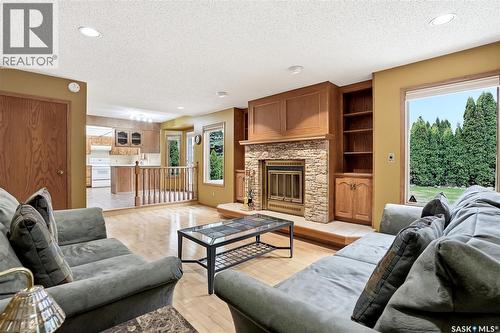 540 Nesslin Crescent, Saskatoon, SK - Indoor Photo Showing Living Room With Fireplace