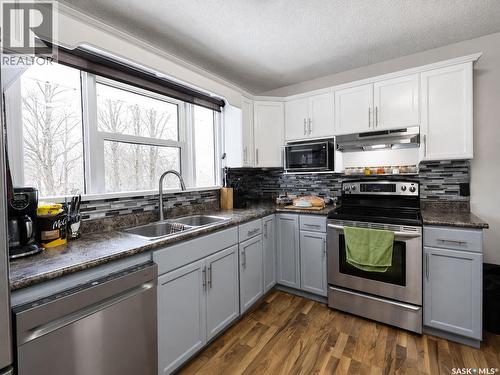 312 20Th Street E, Prince Albert, SK - Indoor Photo Showing Kitchen With Stainless Steel Kitchen With Double Sink