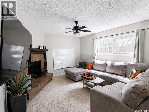 312 20Th Street E, Prince Albert, SK - Indoor Photo Showing Living Room With Fireplace