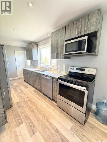 536 Mcgillivray Drive, Weyburn, SK - Indoor Photo Showing Kitchen With Double Sink
