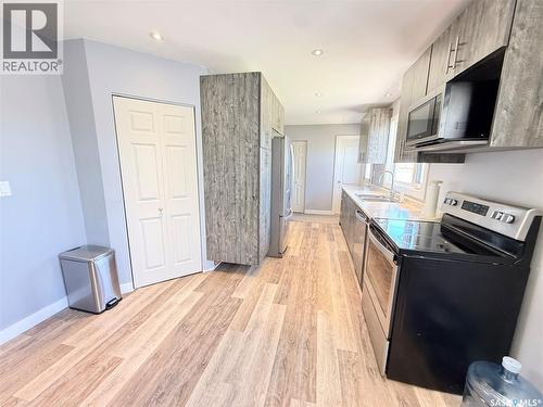 536 Mcgillivray Drive, Weyburn, SK - Indoor Photo Showing Kitchen With Double Sink