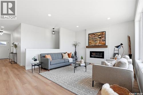 3 Walker Way, Clavet, SK - Indoor Photo Showing Living Room With Fireplace